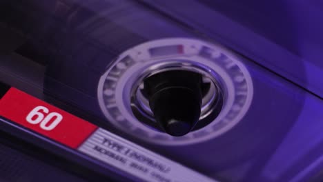 Audio-Cassette-Tape-Reel-Spinning-During-Playback-or-Recording,-Close-Up