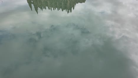 Cathedral-reflection-in-water-with-lift-up-in-Palma-de-Mallorca