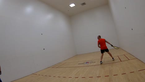 Slow-motion-serve-on-racquetball-court-with-a-return-that-did-not-reach-the-front-wall