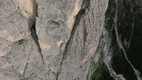 Cinematic-aerial-tilt-up-view-of-the-Selva-mountain-range