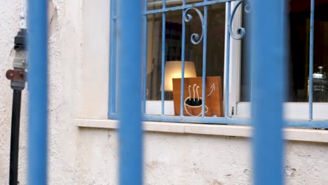 The-coffee-shop-in-the-oldest-city-in-Tel-Aviv-is-taken-with-a-fence-as-a-foreground