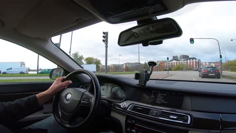 BMW-inside-view-while-driving-in-Copenhagen,-Denmark