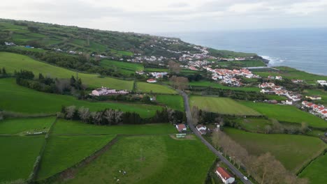 Aerial-view-reveals-the-captivating-and-varied-landscapes-of-Portugal's-Azores-region,-encapsulating-the-spirit-of-adventure-and-uncovering-new-horizons