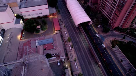 Twilight-aerial-view-of-Rodrigo-de-Araya-metro-station-amidst-cityscape