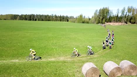 Cyclists-taking-a-turn-in-the-off-road-section-of-this-race