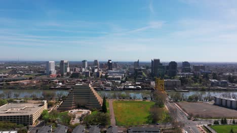 Panning-to-the-left-drone-shot-high-up-over-downtown-Sacramento,-California