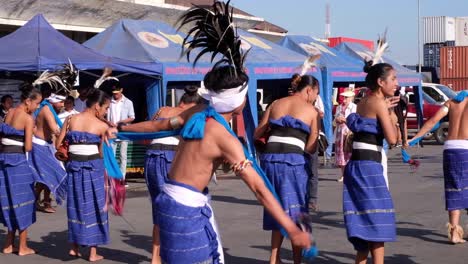A-traditional-Timorese-cultural-dance-and-clothing-to-welcome-tourist-cruise-passengers-to-the-capital-Dili,-Timor-Leste,-Southeast-Asia-for-the-day-in-August-2019