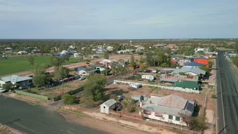 Aerial-Drone-fly-Above-Yelarbon-dry-Australian-Landscape-around-village-area-farm-countryside-roads-and-houses