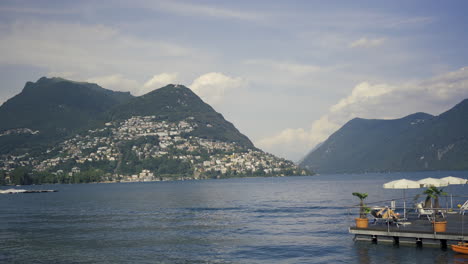 View-of-the-lake-Lugano,-mountains-and-city-Lugano,-Ticino-canton,-Switzerland