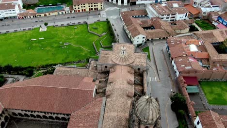 4k-Daytime-drone-shot-of-Qorikancha-from-Cusco,-Peru,-tilt-down,-dolly-in-and-wide-angle