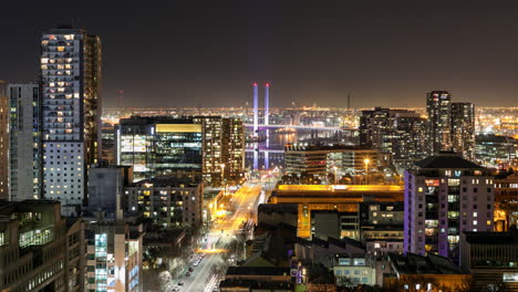 Night-time-lapse-of-traffic-and-the-Bolte-Bridge-at-the-Docklands-of-Melbourne,-Australia