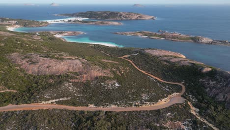 Path-on-hills-in-front-of-Wharton-Beach,-Western-Australia-during-sunny-day