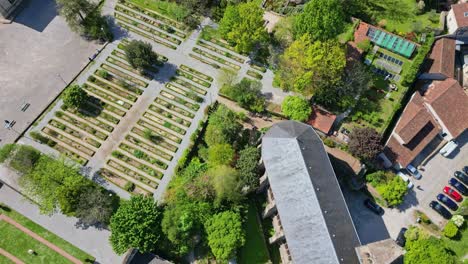 Drone-flying-over-Botanical-garden-of-Bishopric,-Limoges-in-France