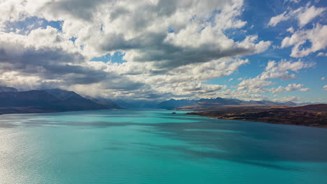 Dramatic-clouds-move-over-Lake-Pukaki-along-road-to-New-Zealand's-highest-peak,-Mount-Cook