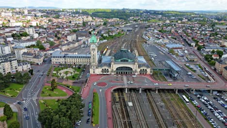 Limoges-Benedictins-station,-France.-Aerial-drone-forward-and-cityscape