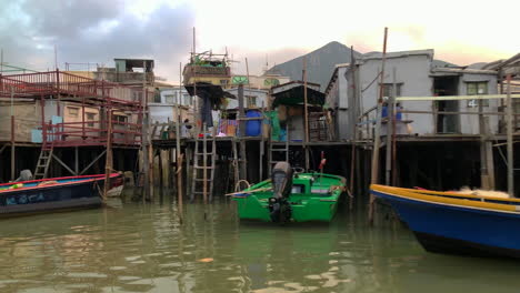 Boat-Ride-along-river-with-Kelong-at-the-sides,-taken-in-one-of-the-islands-off-Hong-Kong