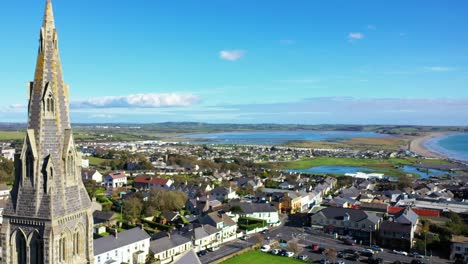 Aerial-over-Holy-Cross-Church-in-Ireland-on-sunny-day,-pedestal-movement
