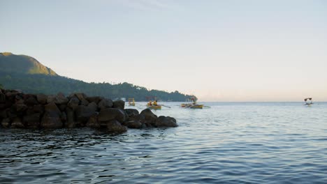 Slow-motion-shot-of-a-rocky-shore-line-in-the-Philippines-right-before-sunset