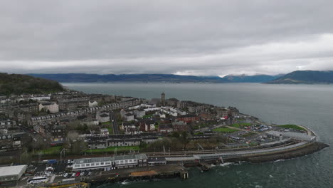 Gourock,-Scotland-on-a-windy-day-over-the-River-Clyde-quickly-orbitting-around-the-headland