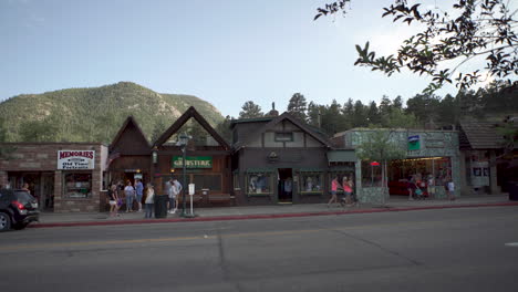 People-walking-around-downtown-main-street-in-a-small-Colorado-mountain-town