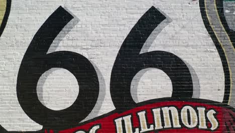 Classic-Route-66-Pontiac-Illinois-Wall-Painting,-Aerial-Reveal