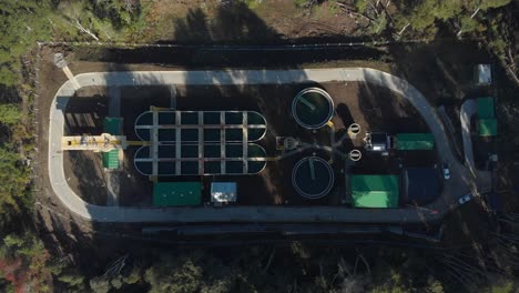 Bird's-eye-view-of-a-water-treatment-plant,-effluent-treatment-in-Villa-La-Angostura,-Patagonia-Argentina