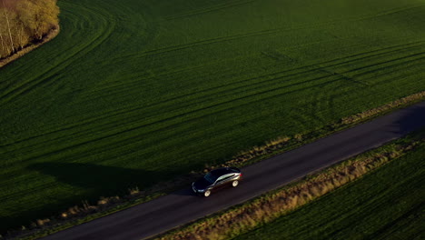 BMW-Driving-along-a-beautiful-countryside-road