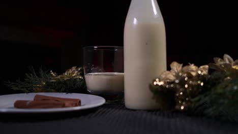 An-African-American-man's-hand-puts-back-a-bottle-of-a-traditional-holiday-drink-Christmas-Eggnog