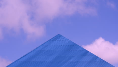 Time-Lapse-of-Clouds-Behind-Blue-Pyramid