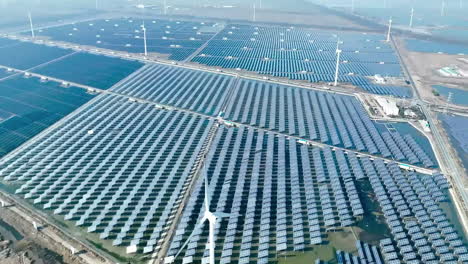 Aerial-View-Large-Industrial-Solar-Panels-Farm-Generating-Power-Clean-Energy-Of-Green-Renewable-Energy-Video