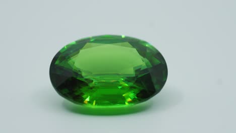 Polished-green-gemstone-rotates-and-sparkles
