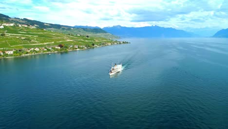 Aerial-orbiting-around-CGN-Belle-Epoque-steam-boat-in-front-of-Villette,-Lake-Leman---Lavaux,-Switzerland
