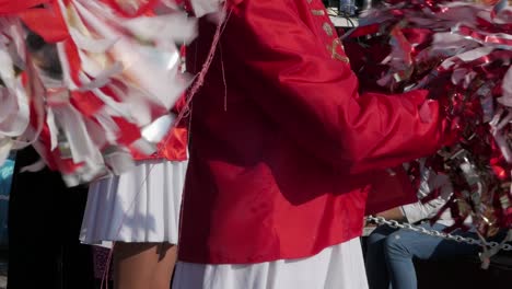 Close-up-of-girls-shaking-pom-poms-during-the-parade-at-the-Paphos-Carnival
