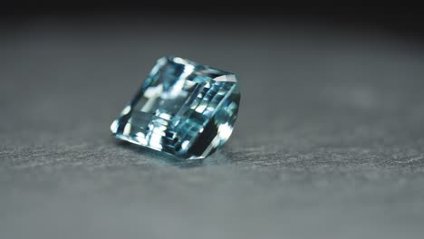 Polished-blue-gemstone-rotates-and-sparkles