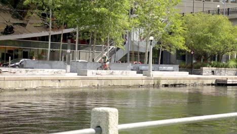 Bicycle-passing-on-the-other-side-of-Rideau-Canal