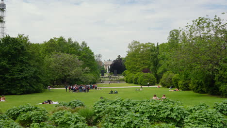 Lush-park-with-people-relaxing-and-strolling-in-Milan