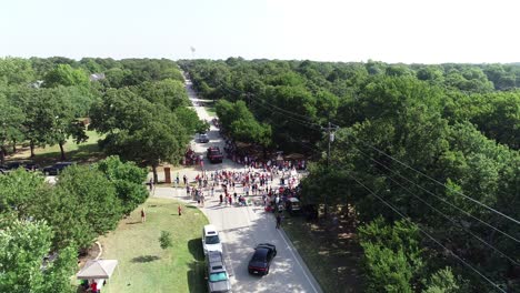 Aerial-view-of-forth-of-July-parade-in-in-Double-Oak-Texas