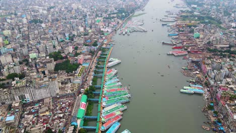 Buriganga-River-Port-In-Dhaka-City,-Bangladesh---Aerial-Drone-Shot