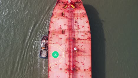 Colourful-massive-oil-tanker-from-directly-above---aerial-drone,-gimbal-down,-River-Mersey,-England,-UK