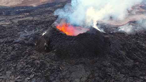 Smoking-volcano-crater-with-bursting-hot-lava-in-volcanic-landscape