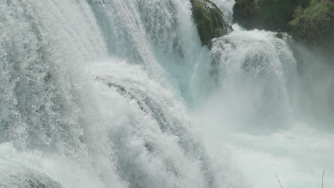 A-waterfall-of-a-pure-wild-river-located-in-a-green-rainforest