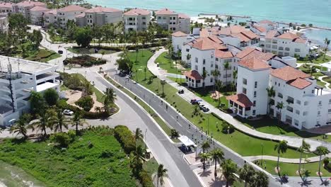 drone-shot-flying-over-beautiful-residential-summer-resort-of-punta-cana,-dominican-republic