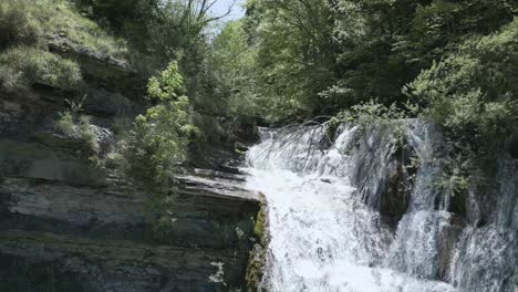 Soar-above-an-enchanting-waterfall-in-Italy-with-this-breathtaking-drone-footage
