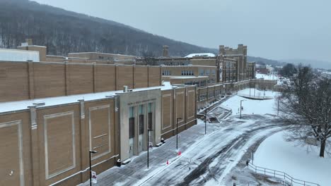 Large-American-high-school-with-no-people-on-snow-day