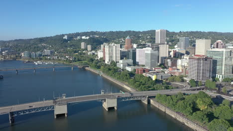 Downtown-Portland-Oregon,-backwards-panning-shot-of-city-skyline