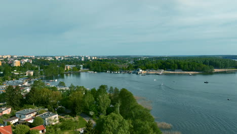 Overlooking-Ukiel-Lake-and-the-adjacent-areas,-this-view-emphasizes-the-integration-of-the-city-with-its-natural-water-based-leisure-spaces