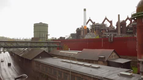 Industrial-heritage-site-Völklinger-Hütte-in-Germany,-showing-preserved-steelworks-on-a-cloudy-day