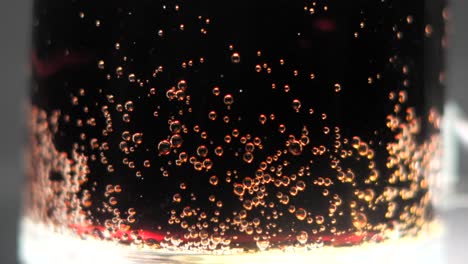 cococola-bubbles-in-glass-with-closeup-view