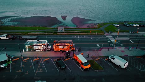 Overview-aerial-Long-Island-Sound-and-mobile-food-trucks-in-New-Haven,-Connecticut,-USA