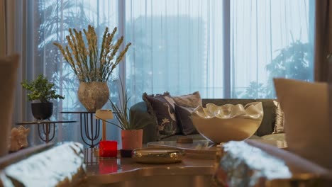 Trendy-Luxury-Living-Room-with-Cozy-Furnishings,-Warm-Lighting,-and-Elegant-Decor